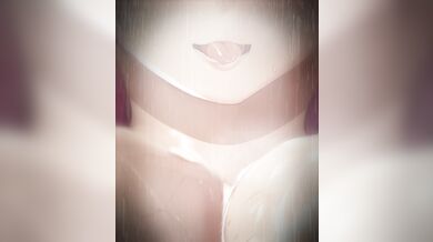 Kafka takes on dominatrix role in the shower as she bends over and spanks her naked body with a whip while moaning with pleasure.